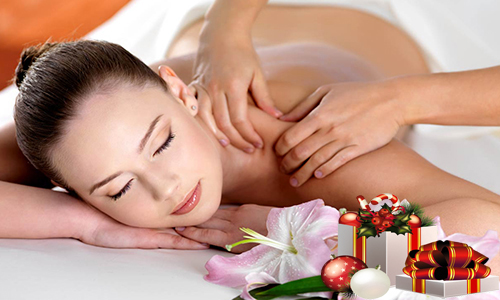 lady receiving swedish massage to her nect whilst lying down